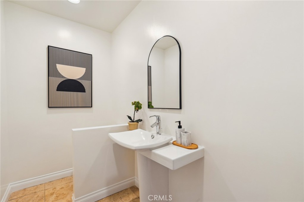 3336 Villa Mesa Road Pasadena, CA 91107 - Photo 21 of 60 a bathroom with a sink and a mirror