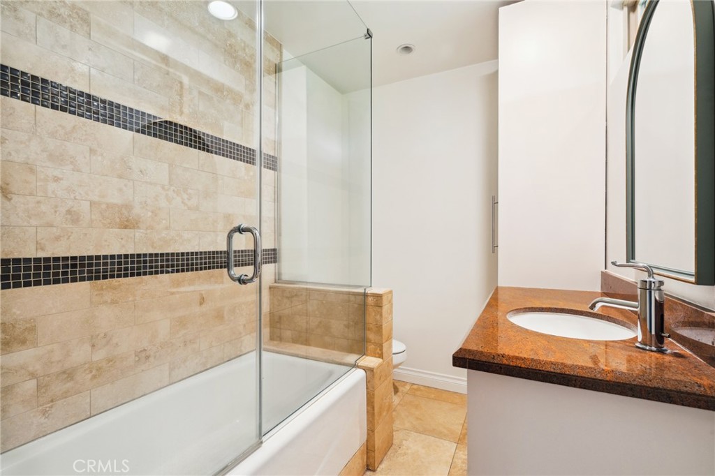 3336 Villa Mesa Road Pasadena, CA 91107 - Photo 22 of 60 a bathroom with a sink and a shower