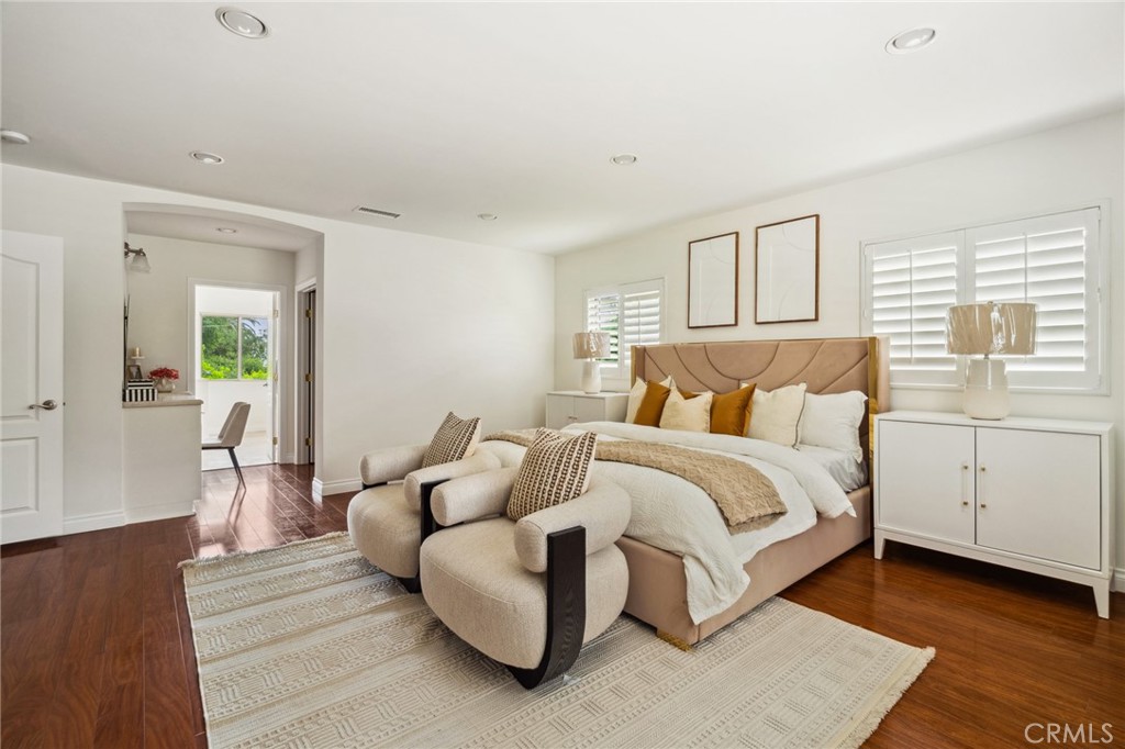 3336 Villa Mesa Road Pasadena, CA 91107 - Photo 24 of 60 a spacious bedroom with a bed and a couch