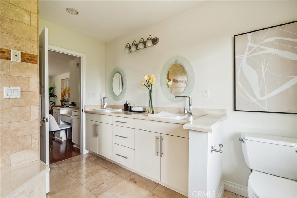3336 Villa Mesa Road Pasadena, CA 91107 - Photo 29 of 60 a bathroom with a double vanity sink and a mirror