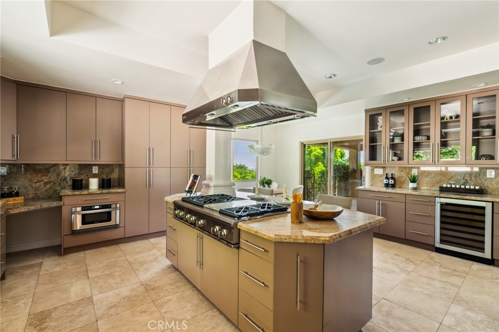 3336 Villa Mesa Road Pasadena, CA 91107 - Photo 5 of 60 a kitchen with stainless steel appliances granite countertop a stove a sink and a refrigerator