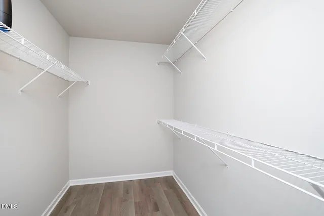 a view of a room that has a window in it