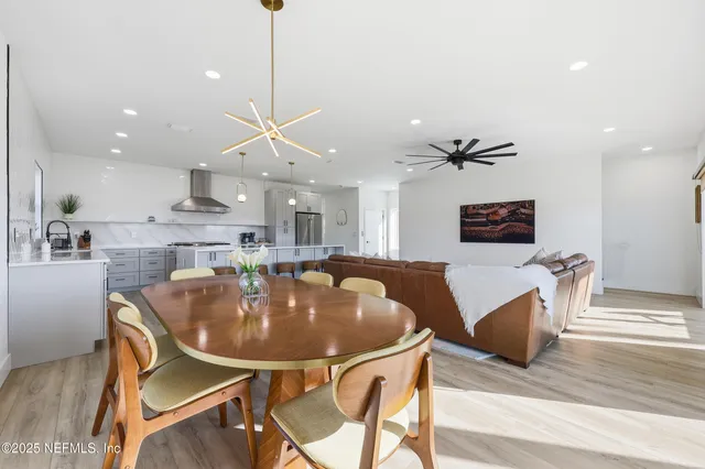 a bedroom with a bed and glass door