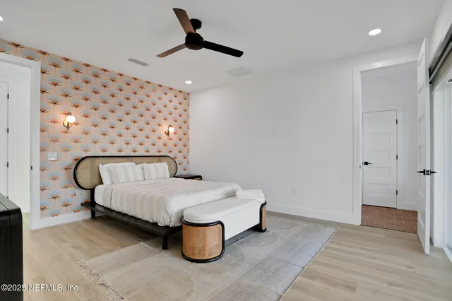 a view of a backyard with sitting area