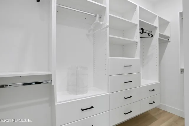 a view of path along with retail shop and buildings