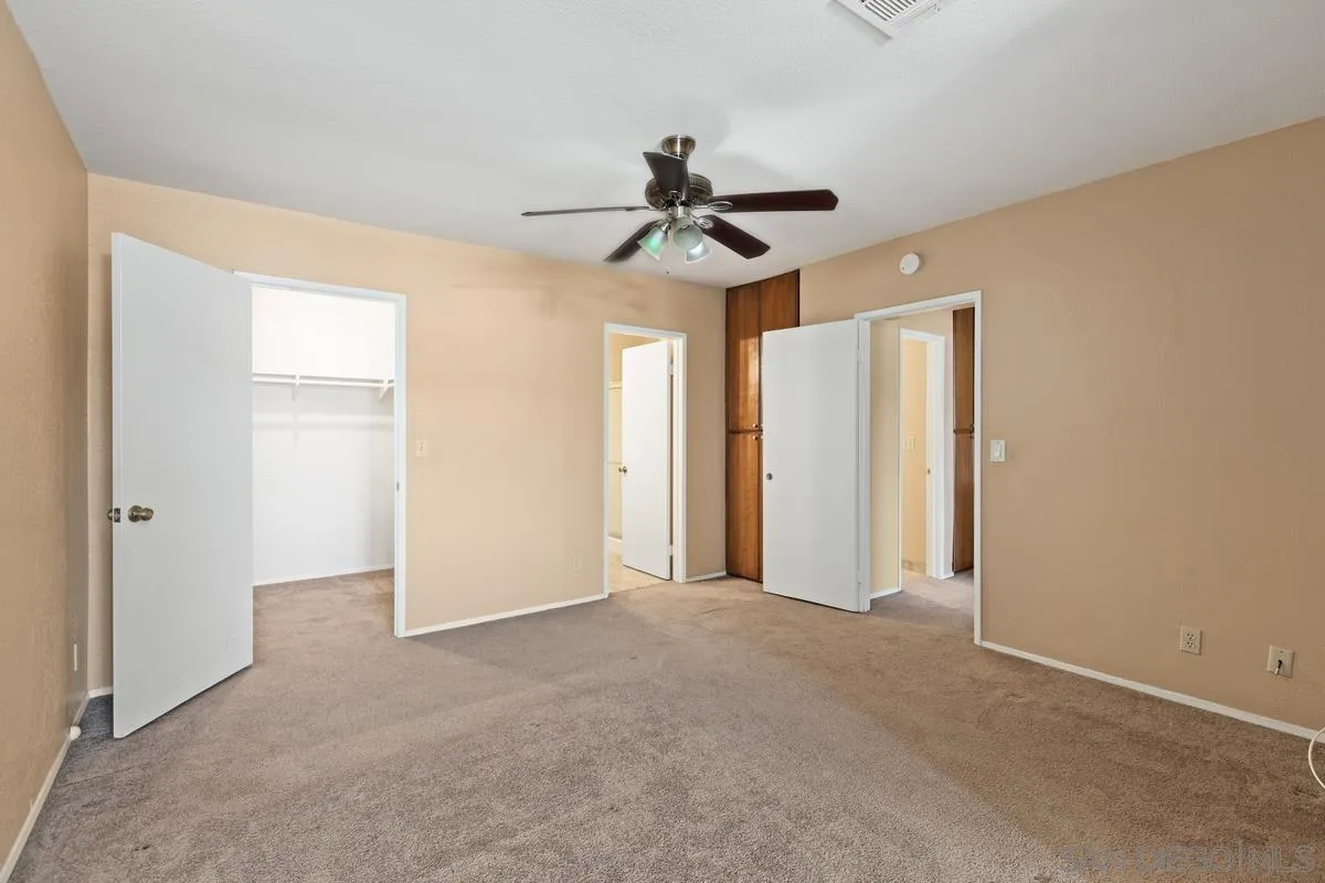 12027 Royal Road, Unit 3 El Cajon, CA 92021 - Photo 13 of 20 a view of a chandelier fan in a room