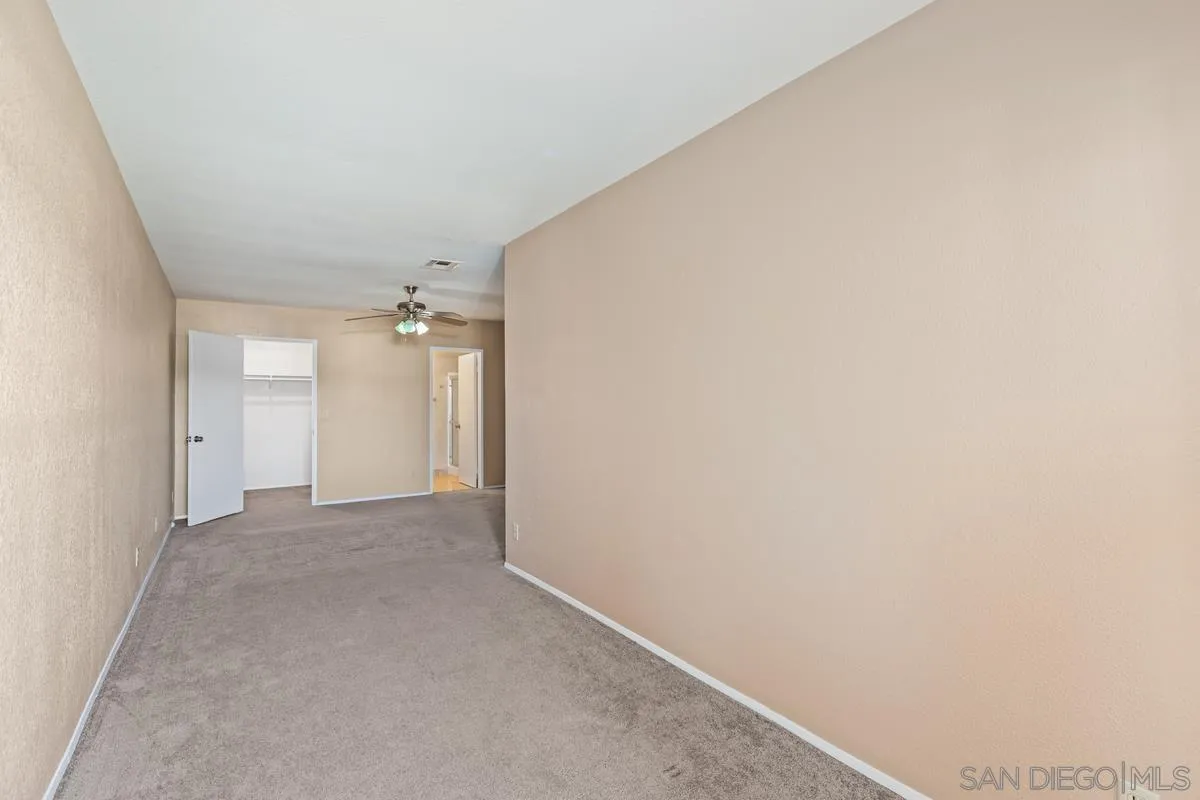 12027 Royal Road, Unit 3 El Cajon, CA 92021 - Photo 14 of 20 a view of a big room with closet and cabinet