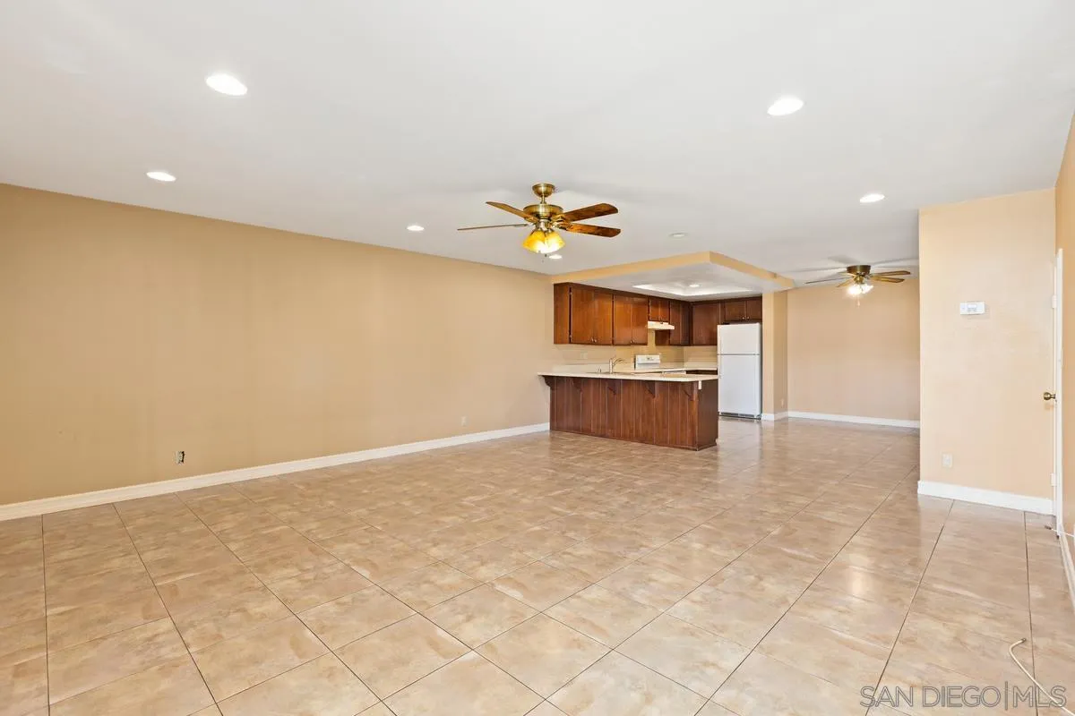 12027 Royal Road, Unit 3 El Cajon, CA 92021 - Photo 16 of 20 a view of kitchen and kitchen with stainless steel appliances