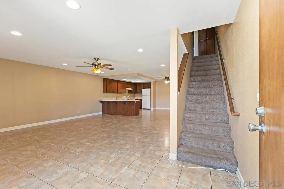 12027 Royal Road, Unit 3 El Cajon, CA 92021 - Photo 2 of 20 wooden floor in an empty room with a kitchen