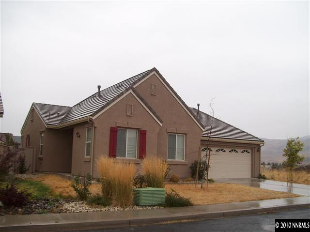 2115 Huntsdale Drive Reno, NV 89521 - Photo 1 of 7 a front view of a house with yard
