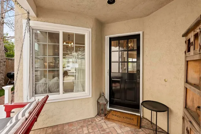 a living room with kitchen island furniture and a wooden floor