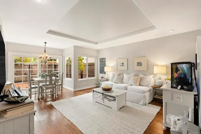 a bathroom with a toilet a sink and a mirror