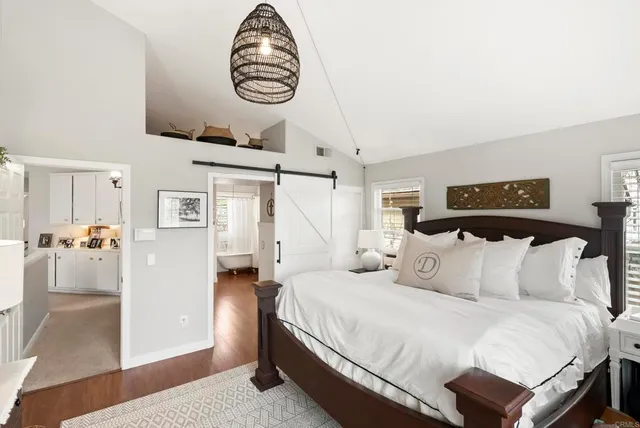 a view of a patio with table and chairs and potted plants