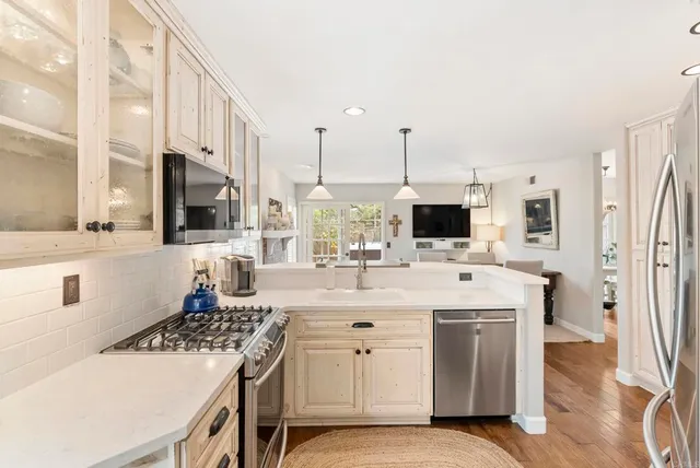 a bathroom with a sink toilet and tub