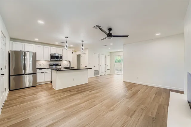 a view of a backyard of the house