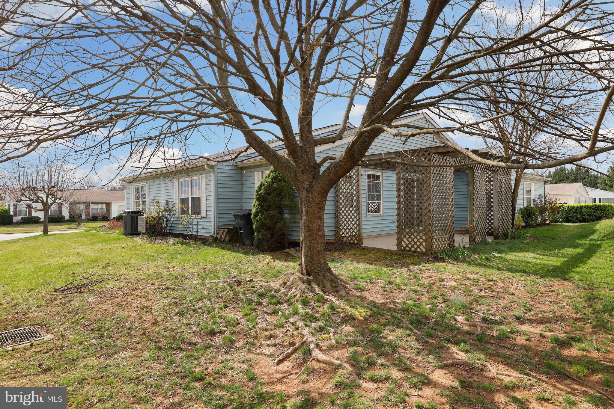 5652 Sandy Court Frederick, MD 21703 - Photo 25 of 35 a house that has a tree in front of it