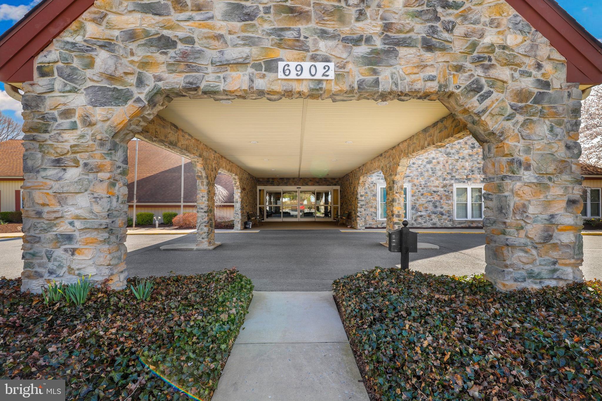 5652 Sandy Court Frederick, MD 21703 - Photo 29 of 35 a front view of a house with garden