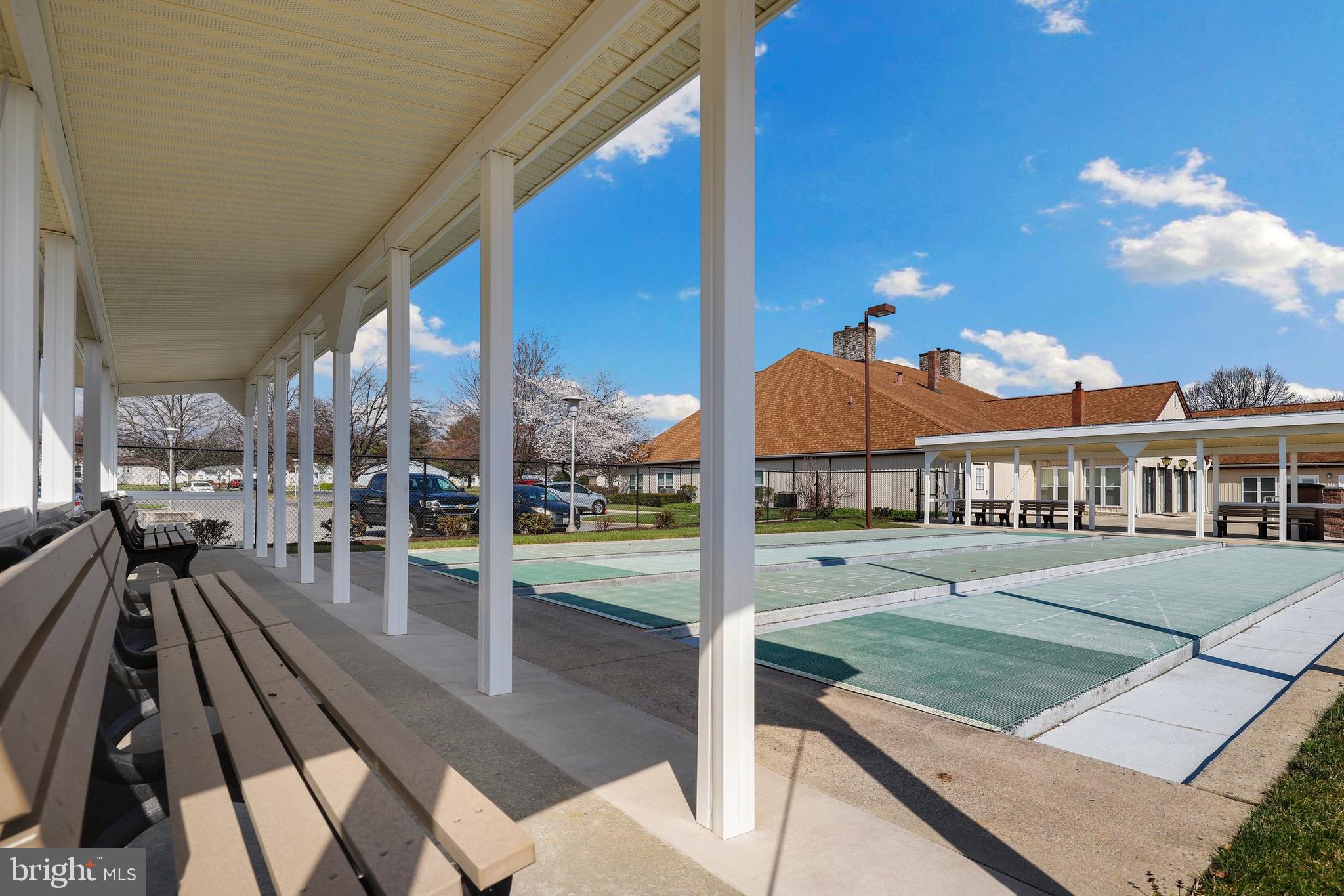 5652 Sandy Court Frederick, MD 21703 - Photo 30 of 35 a view of a patio with swimming pool table and chairs