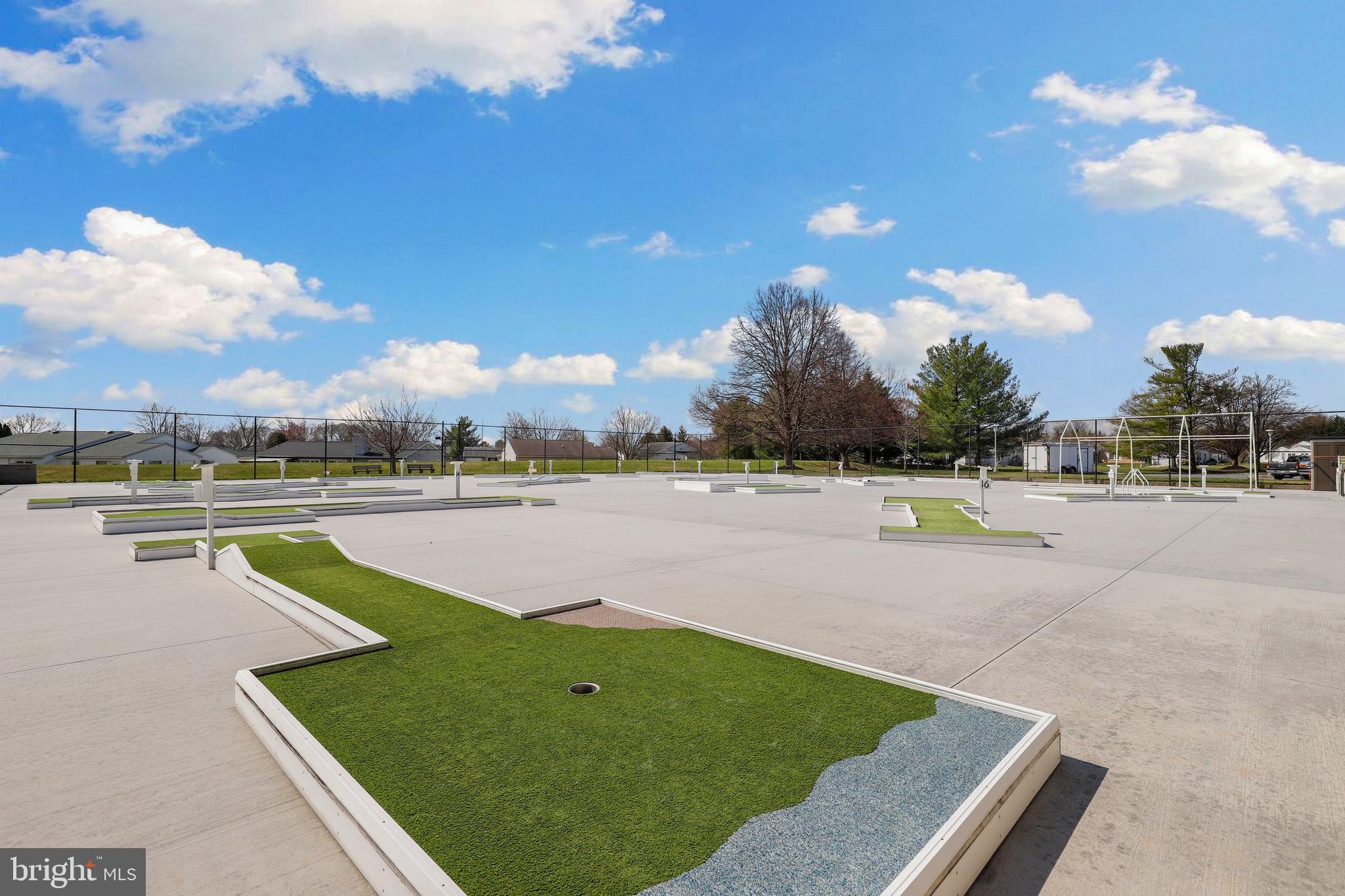5652 Sandy Court Frederick, MD 21703 - Photo 31 of 35 a view of a swimming pool with outdoor seating and yard