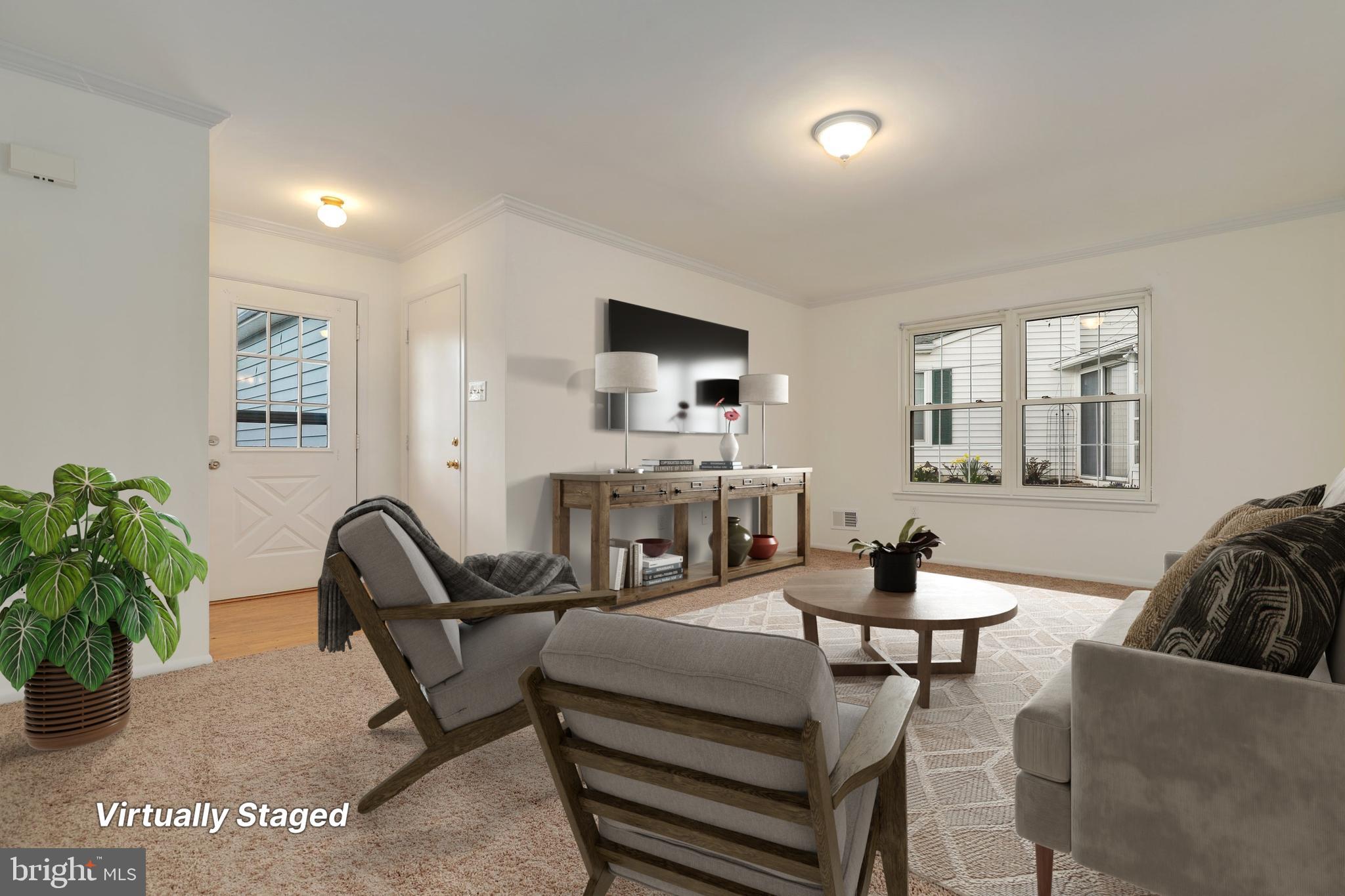 5652 Sandy Court Frederick, MD 21703 - Photo 4 of 35 a living room with furniture and a flat screen tv