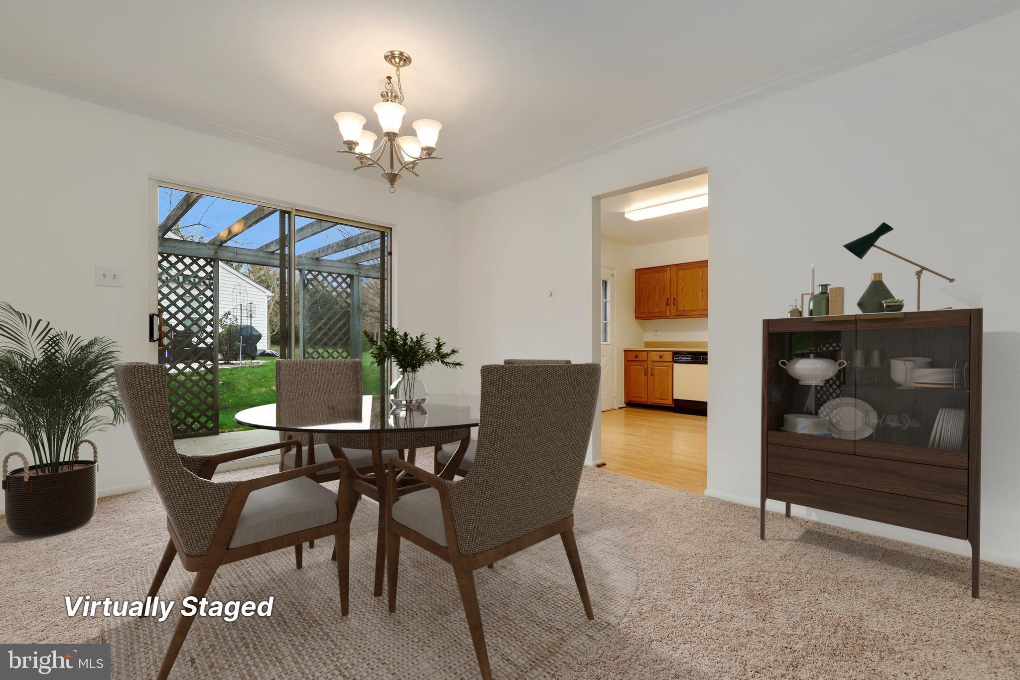 5652 Sandy Court Frederick, MD 21703 - Photo 8 of 35 a view of a dining room with furniture and chandelier