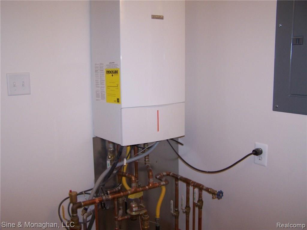 1812 North River Road St. Clair, MI 48079 - Photo 13 of 16 13 - Bosch furnace and hot water heater.JPG