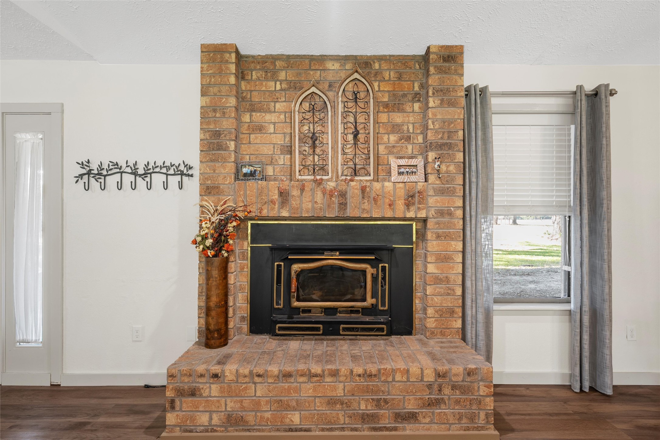 1330 State Highway Kosse, TX 76653 - Photo 23 of 39 a living room with furniture and a fireplace