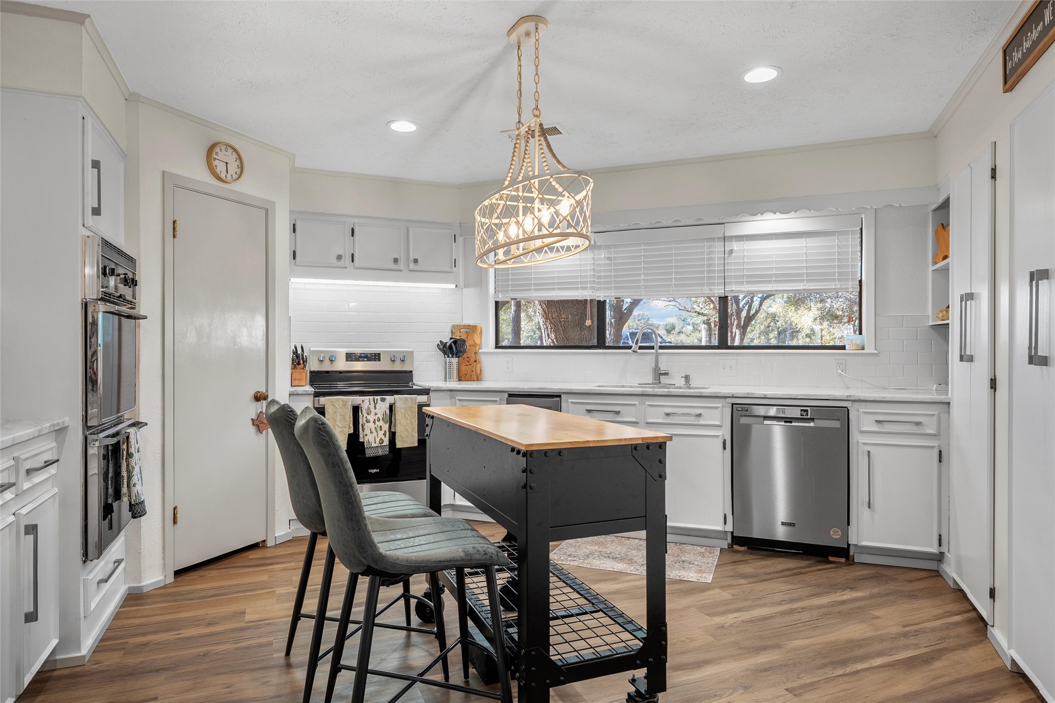 1330 State Highway Kosse, TX 76653 - Photo 25 of 39 a large kitchen with a table and chairs