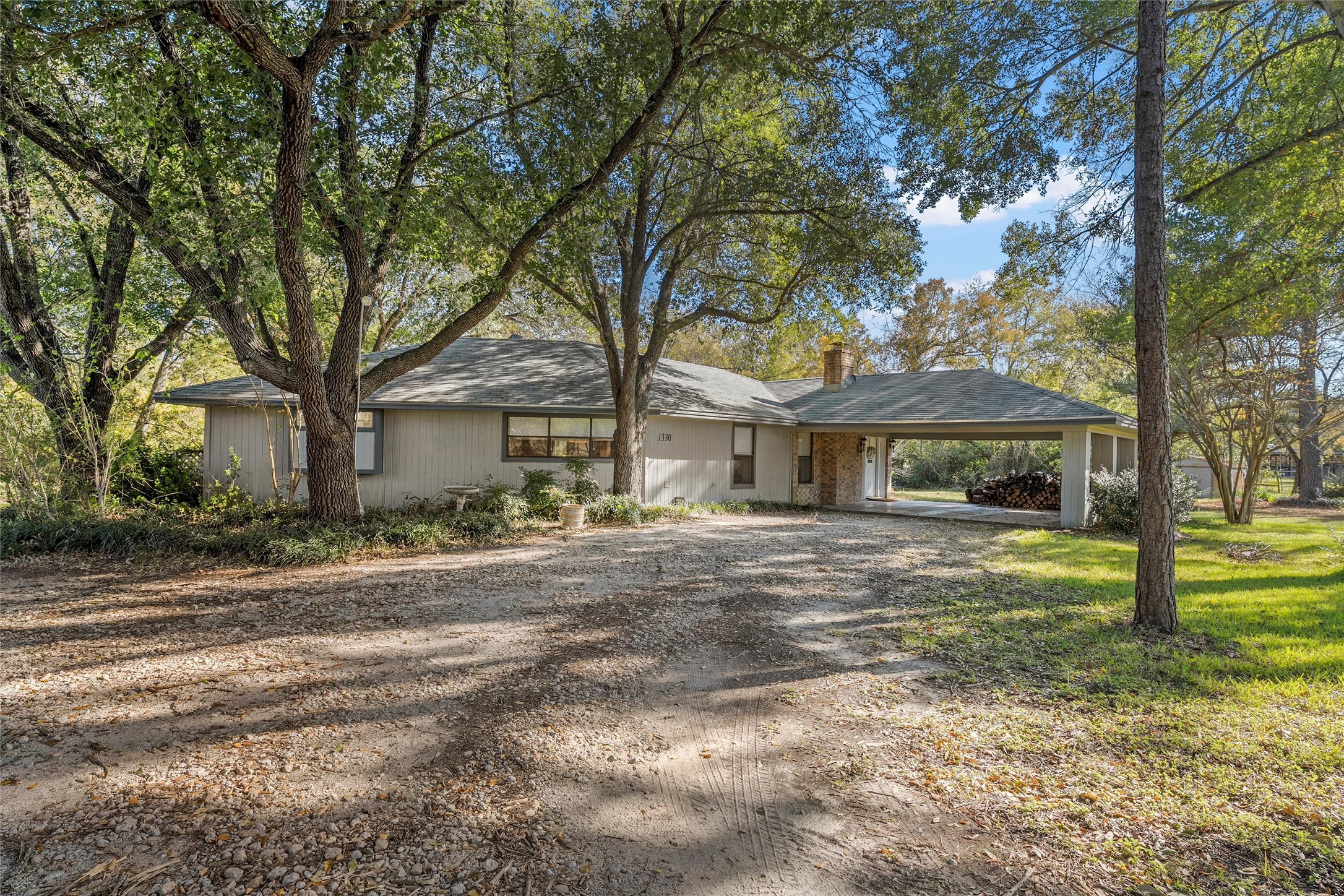 1330 State Highway Kosse, TX 76653 - Photo 6 of 39 a front view of a house with garden
