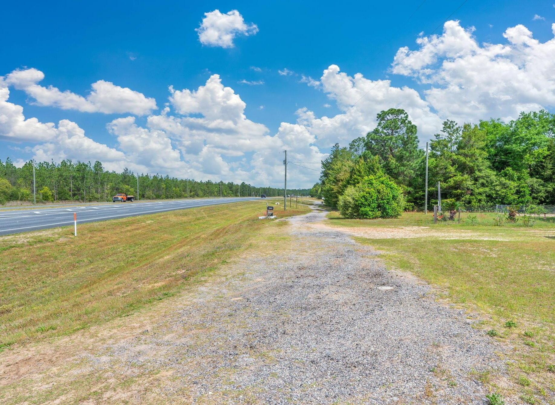 7765 Highway 331 DeFuniak Springs, FL 32435 - Photo 17 of 18 a view of a swimming pool and an outdoor space
