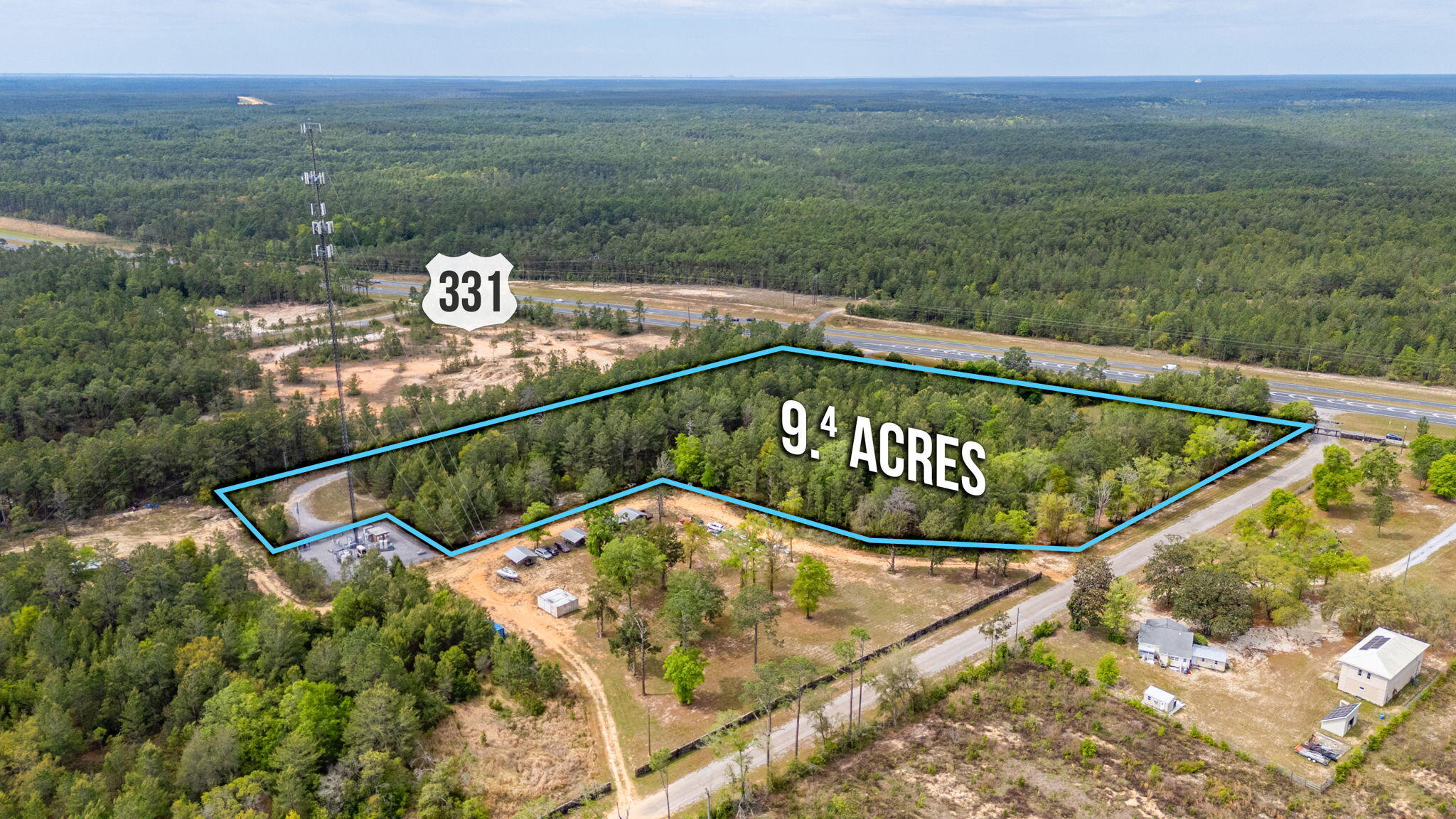 7765 Highway 331 DeFuniak Springs, FL 32435 - Photo 6 of 18 a view of a swimming pool with a yard