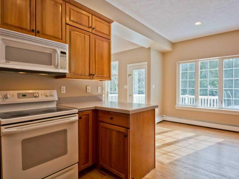 23 Rock Ridge Run Cumberland Center, ME 04021 - Photo 14 of 35 Kitchen. Kitchen with sunny eat-in...