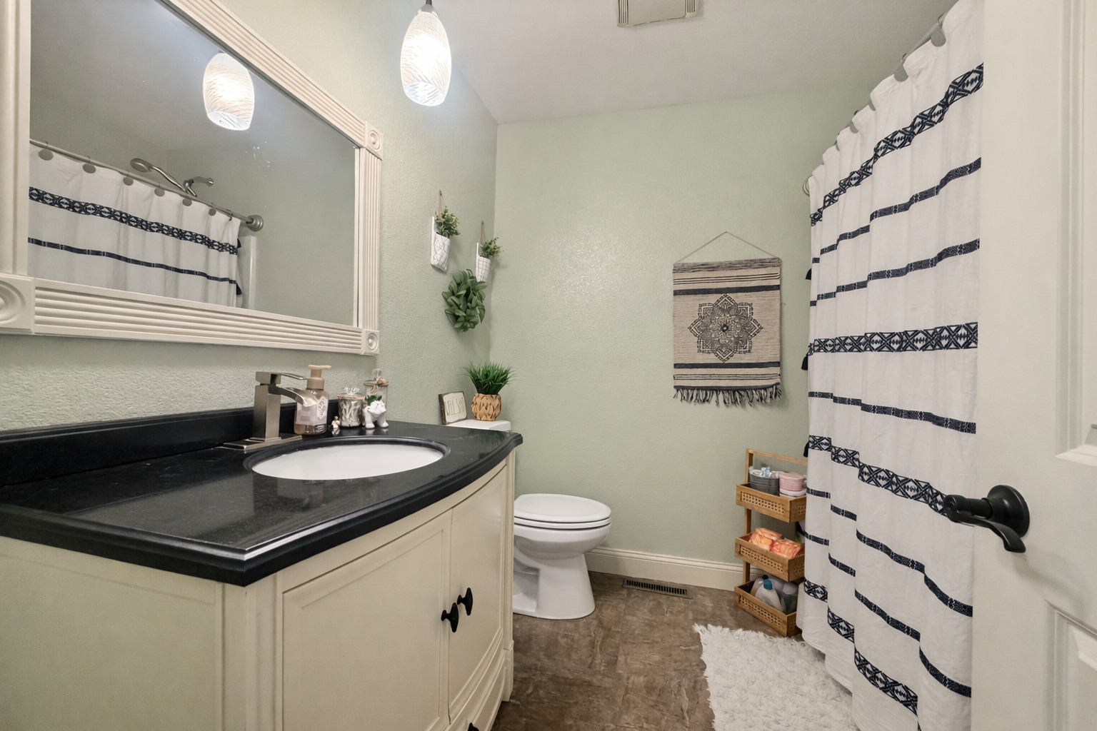 502 Kenneth Drive Heyworth, IL 61745 - Photo 12 of 18 a bathroom with a sink a toilet and a mirror