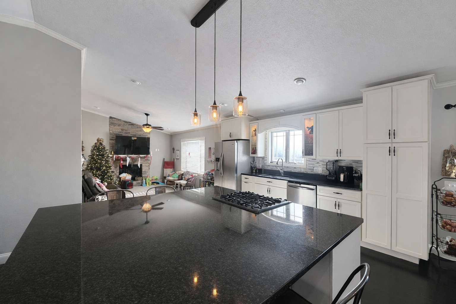 502 Kenneth Drive Heyworth, IL 61745 - Photo 4 of 18 a kitchen with sink refrigerator and cabinets