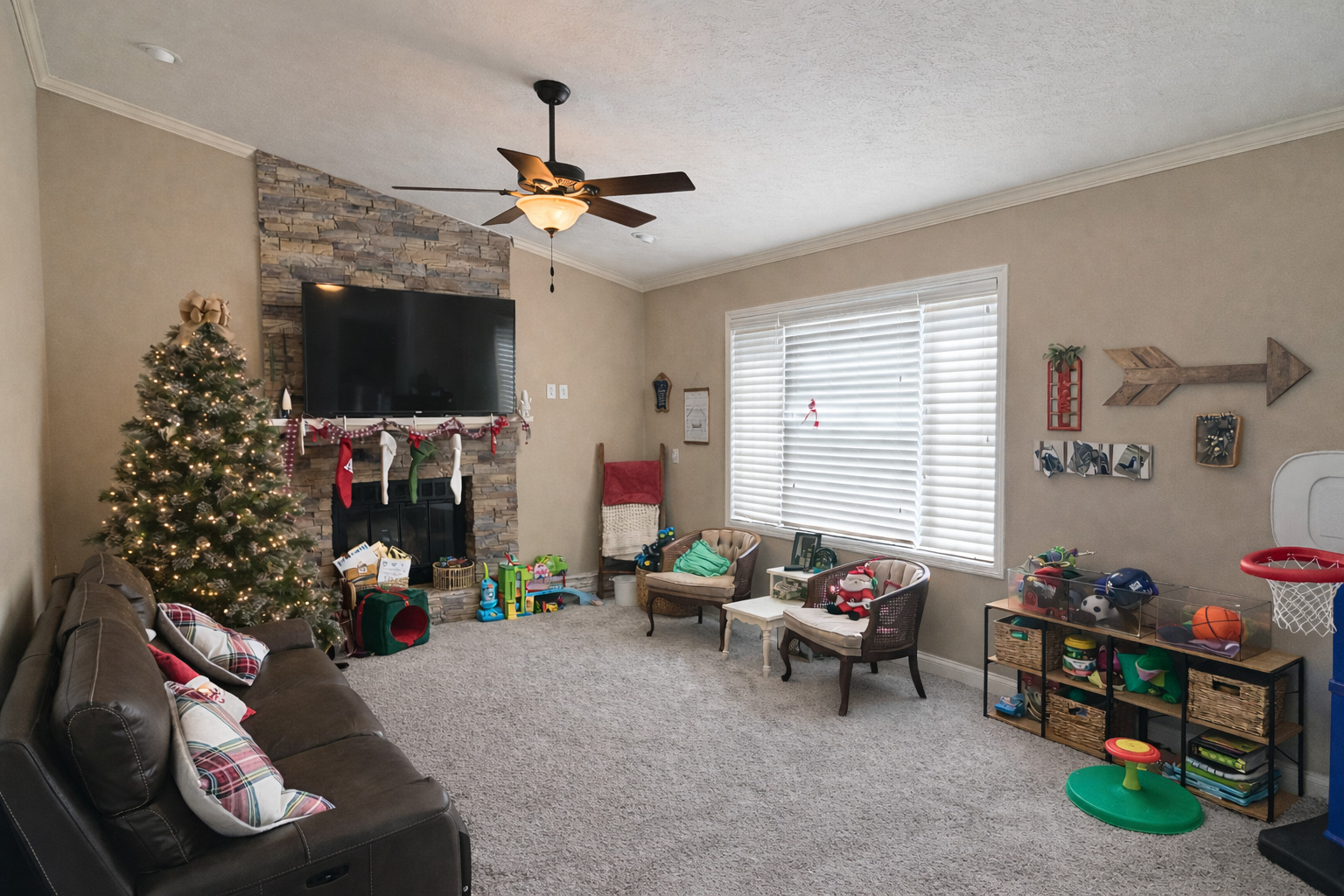502 Kenneth Drive Heyworth, IL 61745 - Photo 6 of 18 a living room with furniture a flat screen tv and a window