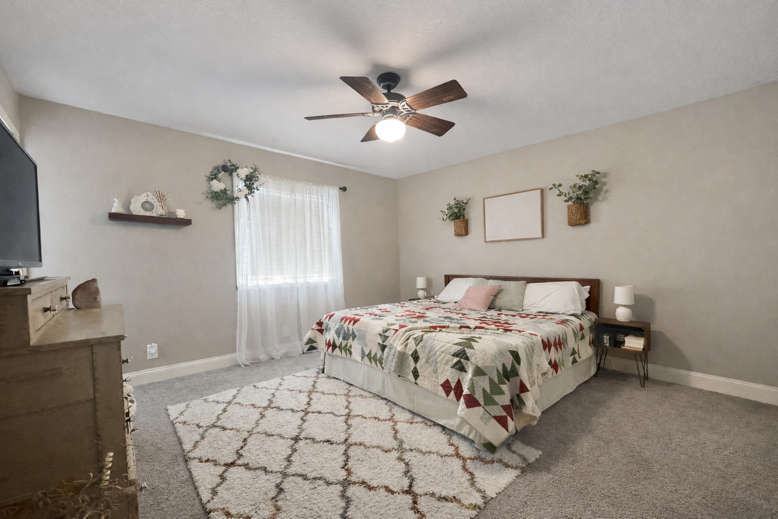 502 Kenneth Drive Heyworth, IL 61745 - Photo 8 of 18 a bedroom with a bed and a chandelier
