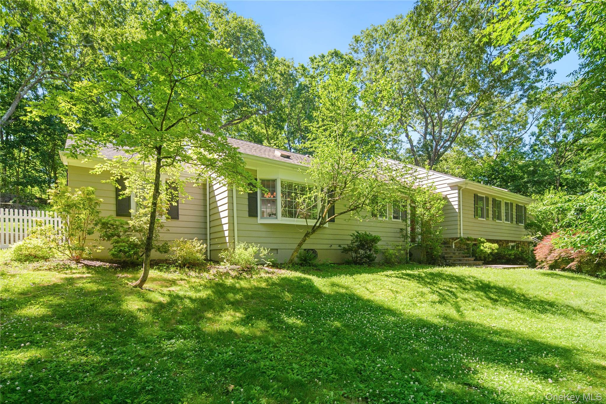 105 Cross Ridge Road Chappaqua, NY 10514 - Photo 3 of 43 The fenced yard is ideal for recreation