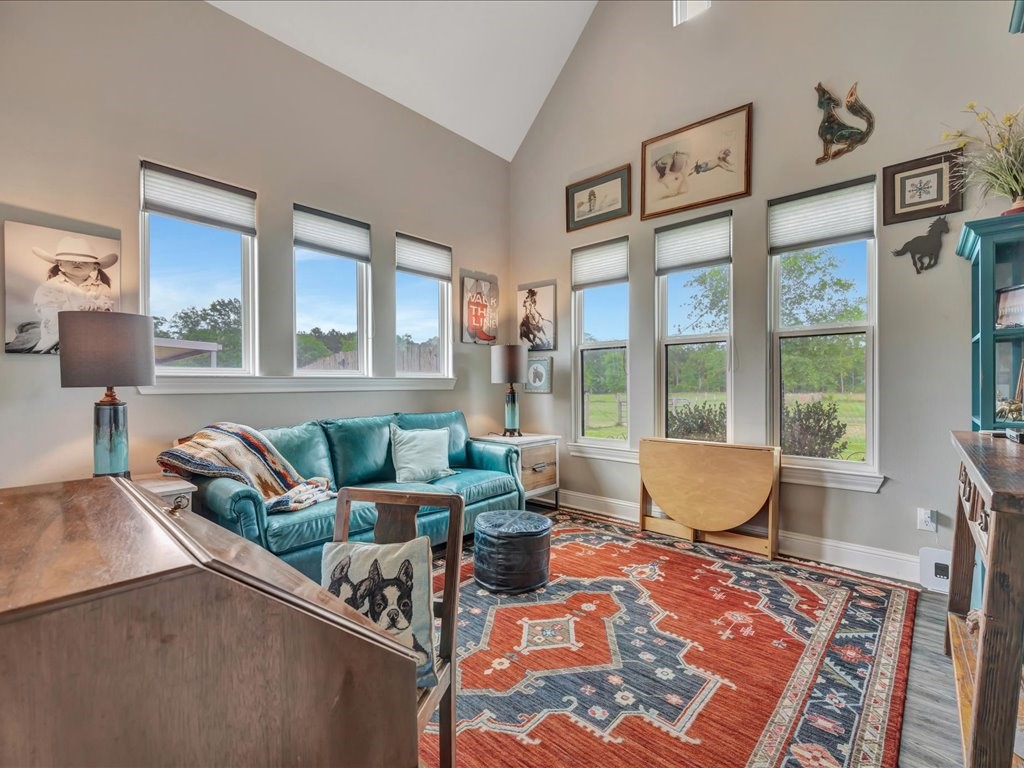 104 Wheeler Road Lufkin, TX 75901 - Photo 24 of 45 a living room with furniture and a table