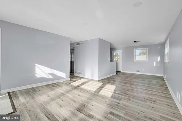 a view of an empty room and window