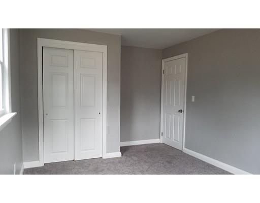 454 Middlesex Turnpike Billerica, MA 01821 - Photo 13 of 15 a black and white photo of a living room