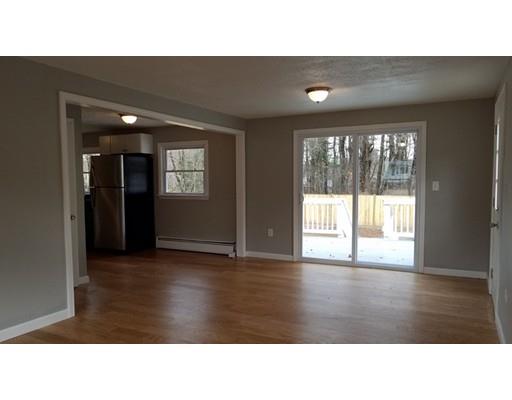 454 Middlesex Turnpike Billerica, MA 01821 - Photo 2 of 15 a black and white photo of a living room