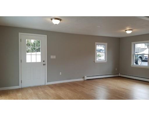 454 Middlesex Turnpike Billerica, MA 01821 - Photo 7 of 15 a open hall with a window
