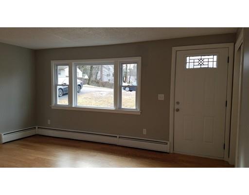 454 Middlesex Turnpike Billerica, MA 01821 - Photo 9 of 15 a black and white photo of a living room