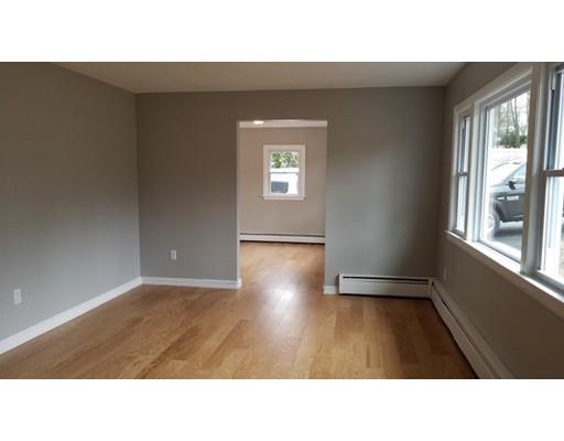 454 Middlesex Turnpike Billerica, MA 01821 - Photo 10 of 15 a open hall with wooden floor and windows