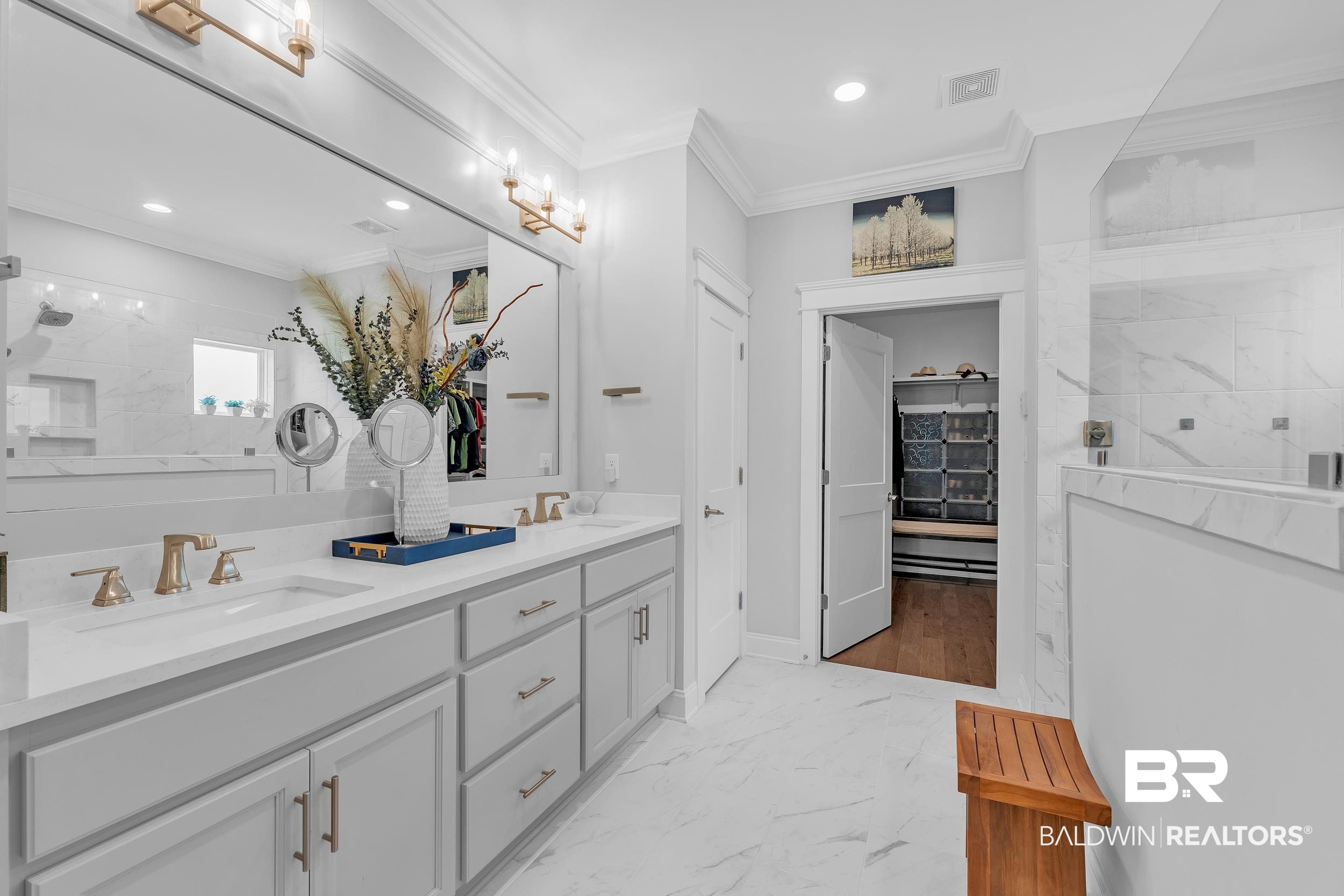 31630 Canopy Loop Daphne, AL 36527 - Photo 16 of 30 Full bath with visible vents, a sink, marble finish floor, and walk in shower