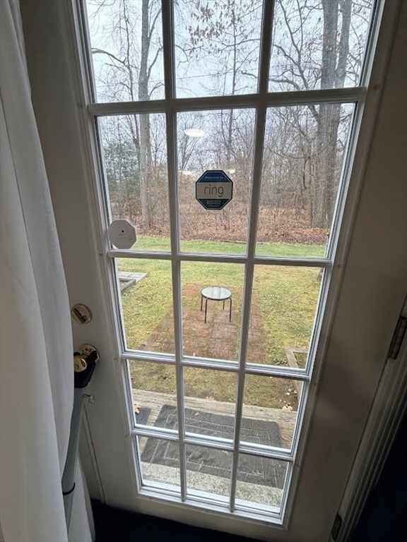 540 Granby Road, Unit 62 South Hadley, MA 01075 - Photo 11 of 20 a view of a room with window and wooden floor
