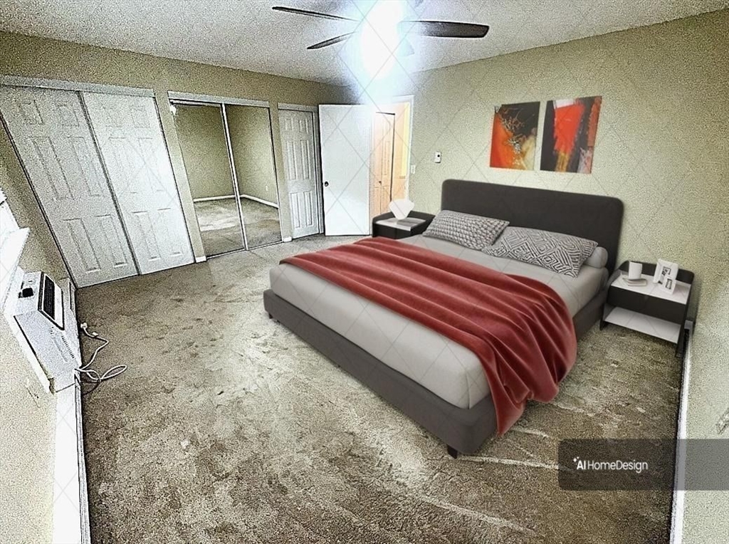 540 Granby Road, Unit 62 South Hadley, MA 01075 - Photo 14 of 20 a bedroom with a bed and a mirror