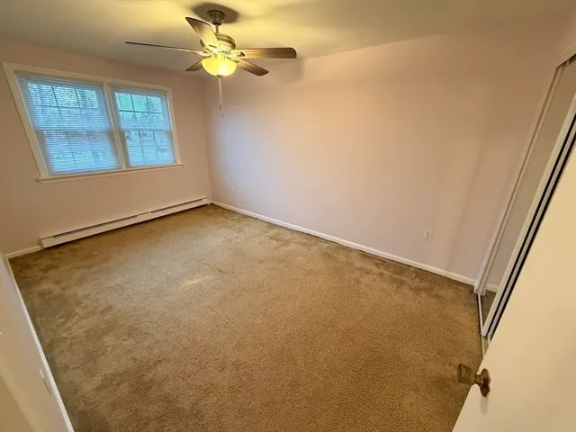 a view of a swimming pool with a chair