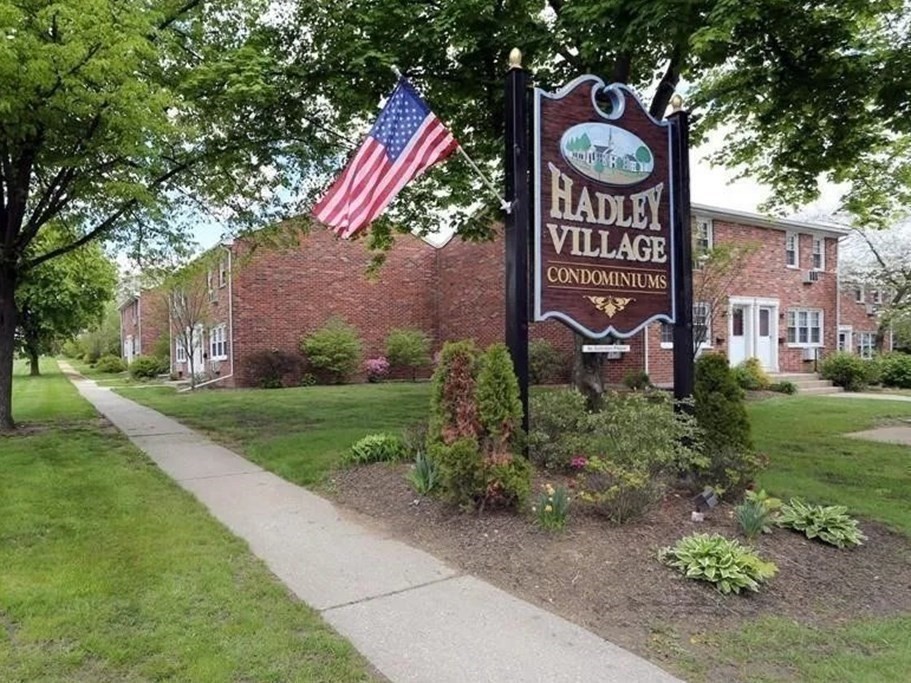 540 Granby Road, Unit 62 South Hadley, MA 01075 - Photo 20 of 20 a sign that is sitting on the side of a road
