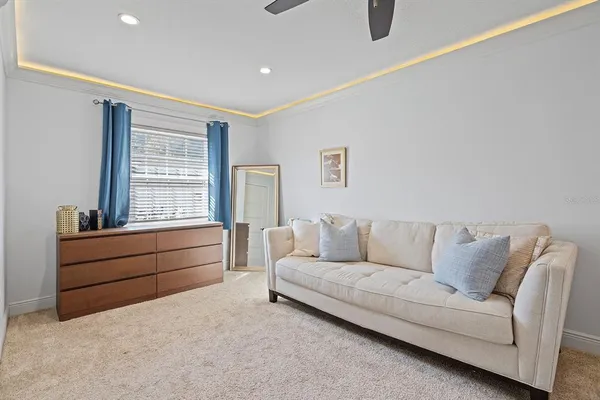 a living room with furniture and a window